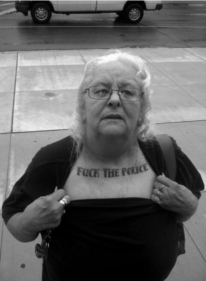 703x960, 79 Kb / Женщина, грудь, тату, fuck the police,ч/б, очки