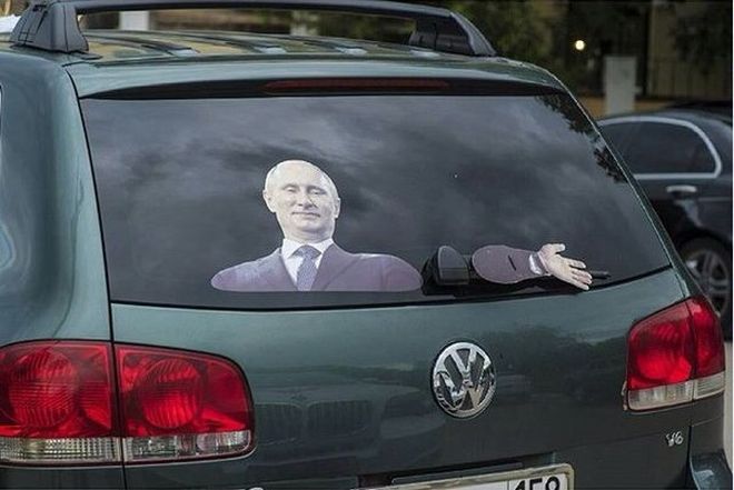 660x441, 49 Kb / путин, дворник, рука, фольксваген, наклейка